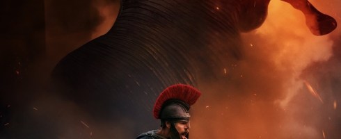Film poster of The Odyssey showing Odysseus, fire and Trojan horse